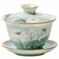 Tazza da tè con coperchio e piattino 150 ml 11.50 cm in porcellana verde chiaro con motivo loto stile tradizionale